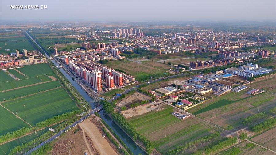 Photo taken on April 24, 2017 shows the scenery of the county seat of Anxin, north China's Hebei Province. China announced the plan for Xiongan New Area, an economic zone about 100 kilometers south of Beijing, on April 1, 2017. The new area will span Xiongxian, Rongcheng and Anxin counties in Hebei Province, eventually covering 2,000 square kilometers. Hebei announced recently it would call for international bids to plan and design Xiongan New Area. Global companies are welcomed to bid with their ideas for a 30-square-km area at initial stage. (Xinhua/Mou Yu) 